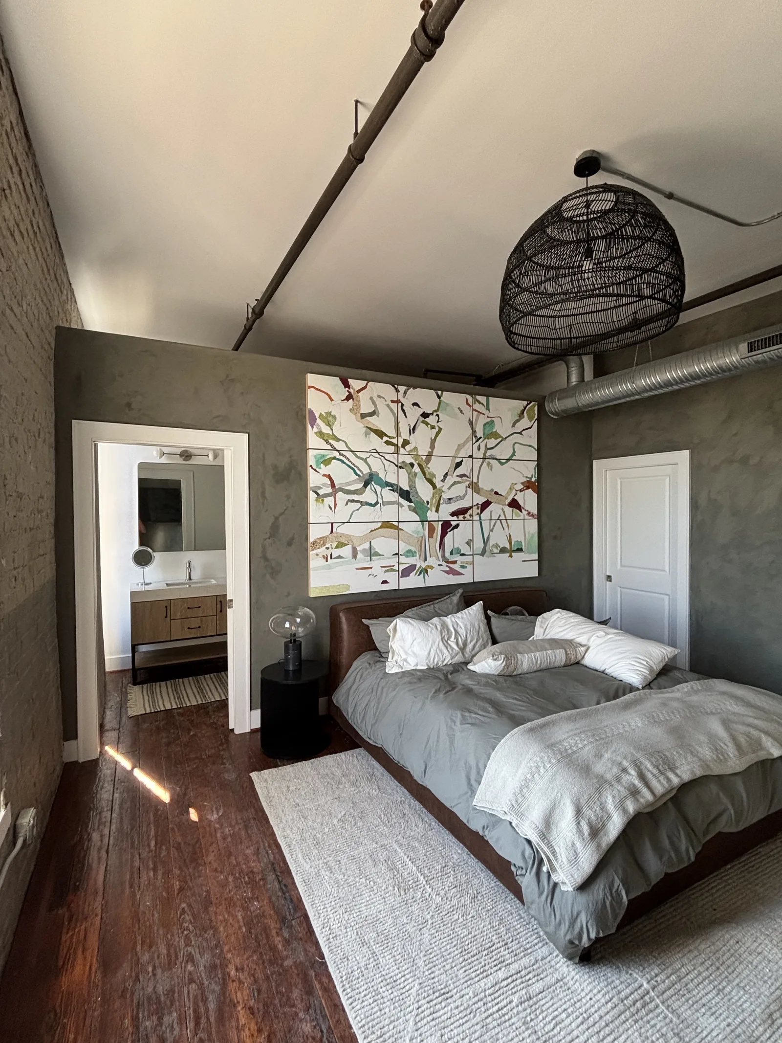 Finished grey wall in a furnished bedroom